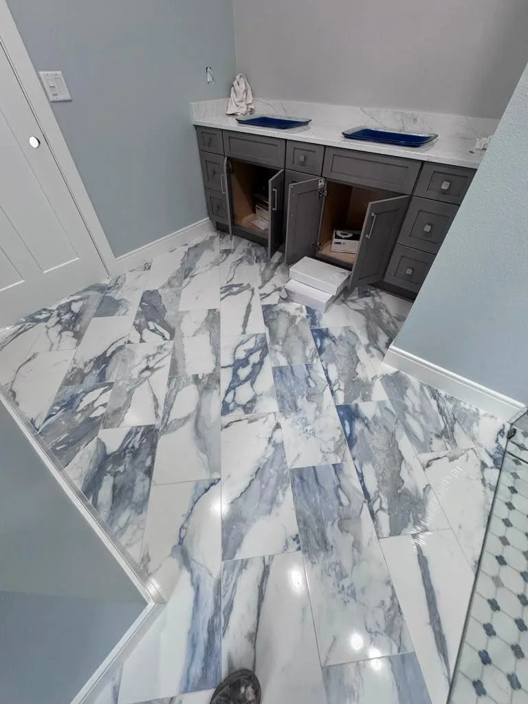 Large-format marble-look floor tile with carefully aligned joints
